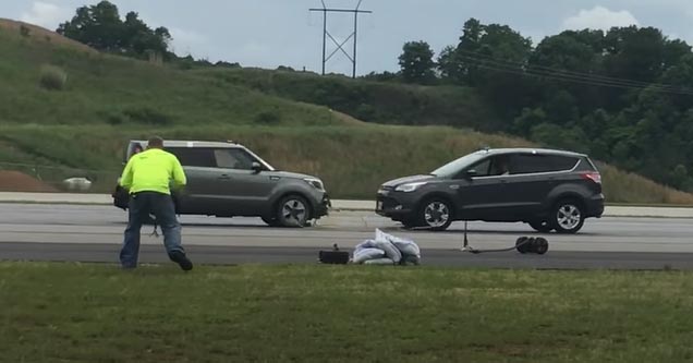 two cars crashing into each other at 40 mph