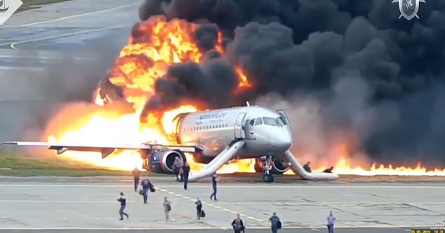 a 747 plane on fire on the runway