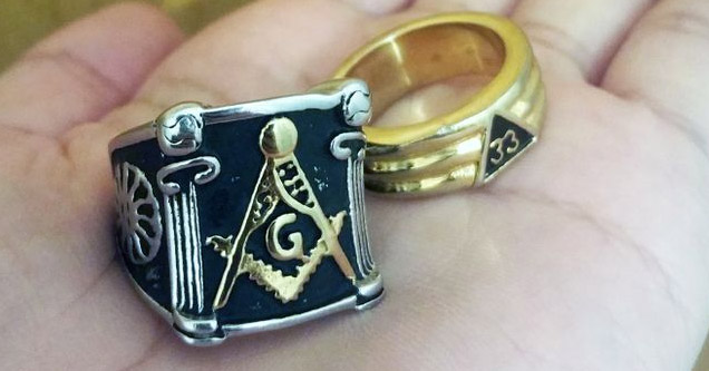 two rings with freemason logos