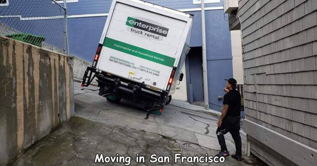 a moving truck on a steep hill in SF