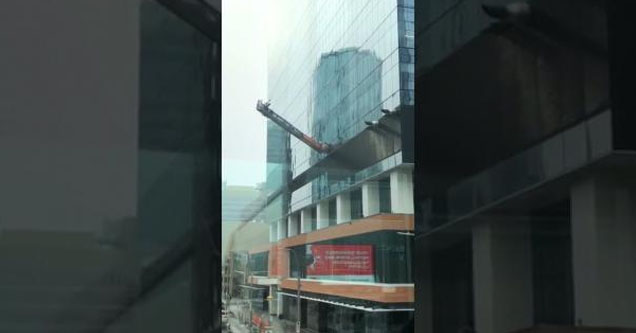 Edmonton window washers whipped around by heavy winds