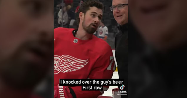 Detroit Red Wings captain Dylan Larkin talks to a Locker Room manager about restituting a fan whose beer he accidentally spilled.