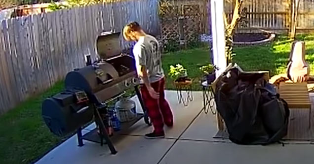 a guy cooking on propane grill