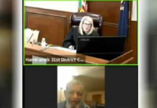 Judge Alexis G. Krot berates elderly cancer patient during his court hearing