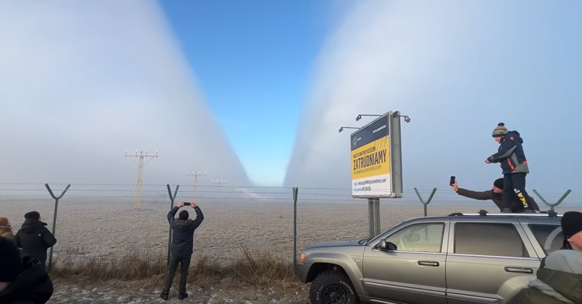 fog being split by an an-225 landing