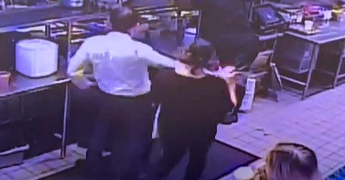 a man accidentally karate chopping a coworkers carrying coffee