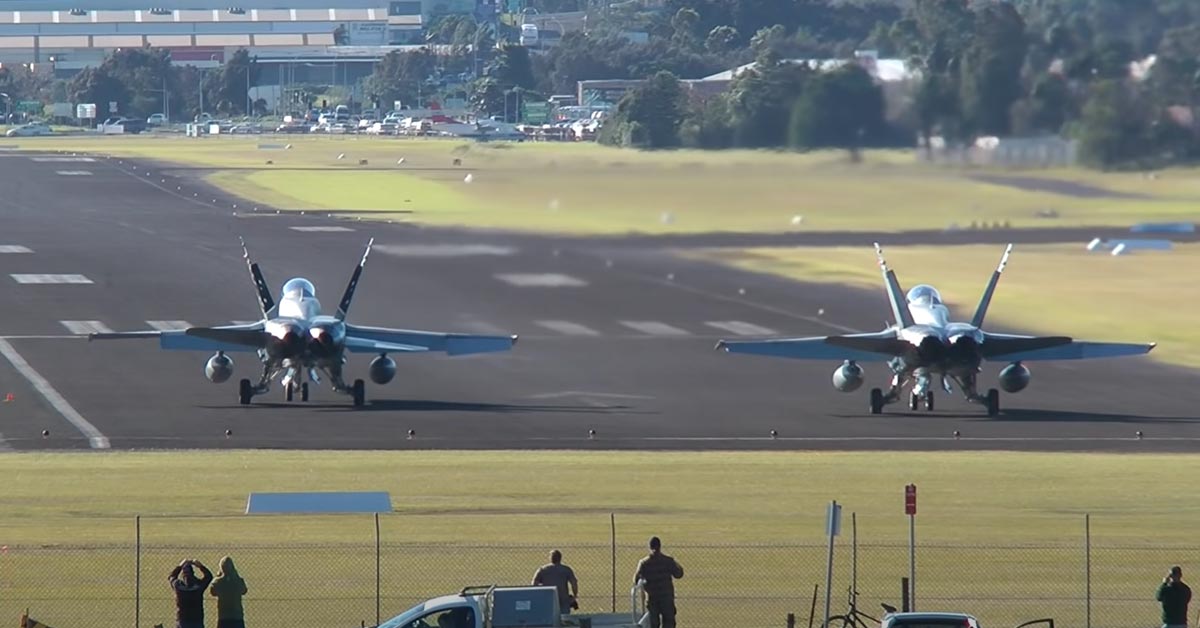 two FA-18 hornets taking off