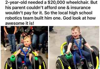 a little boy in a wheelchair the local high school built for him