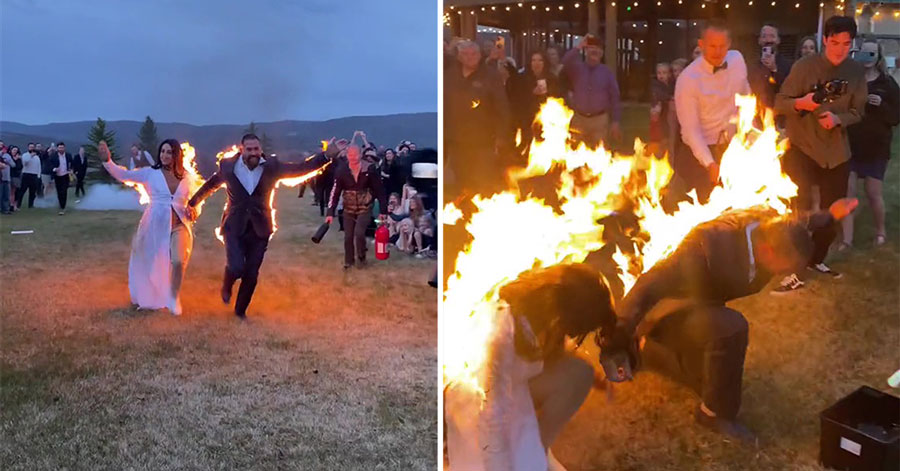 couple walk down the aisle while on fire