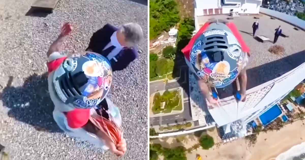 Paraglider Jumps off of Building