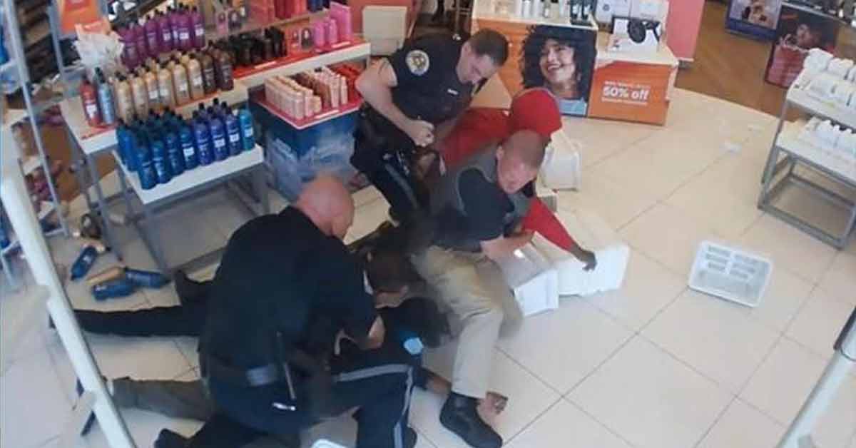 cops tackling thieves in beauty store