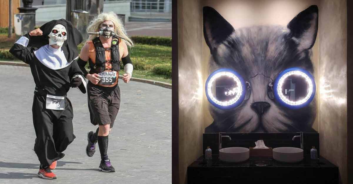 people cosplaying and a mural of a cat with light up eyes in bathroom