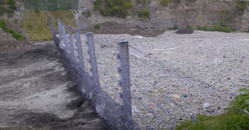 trashfence catches an incredible amount of plastic				           fence stops river plastic trash ocean cleanup guatemalas rio motagua basin