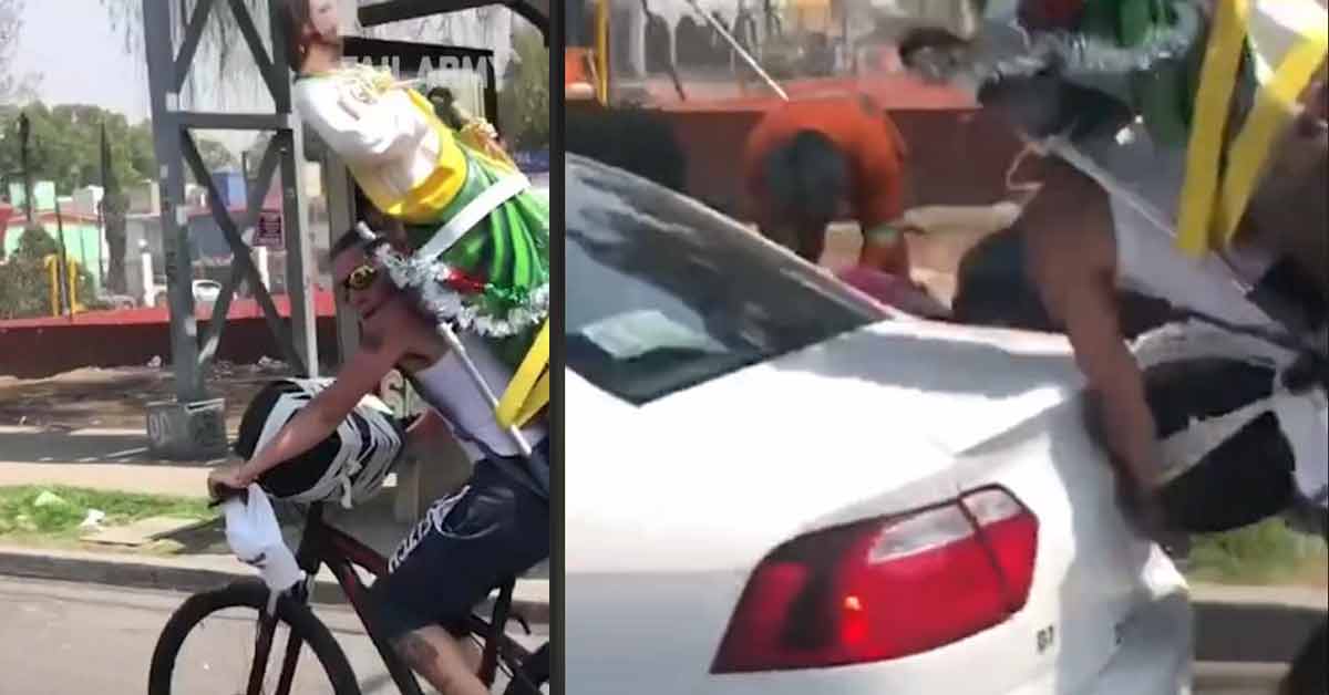 guy on bike slamming into a parked car