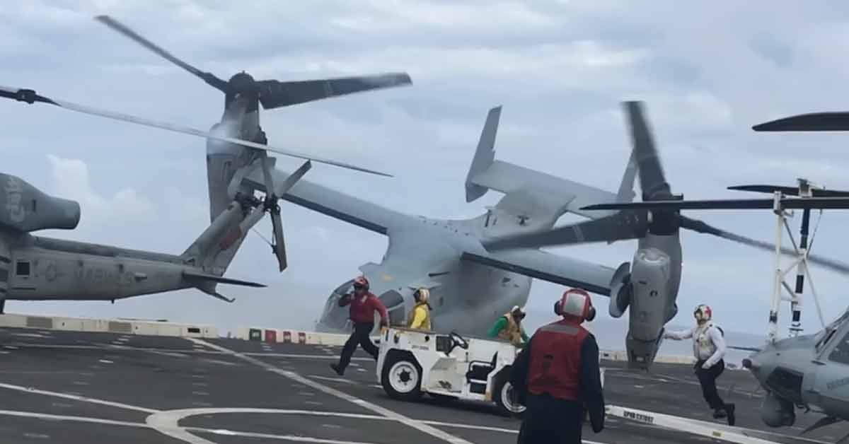 an osprey crashing onto an aircraft carrier