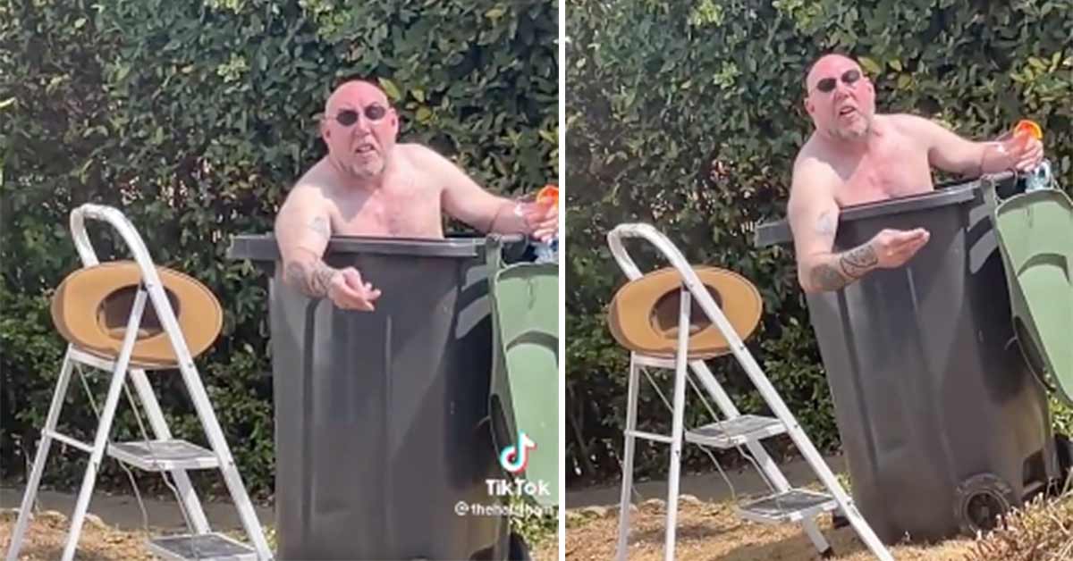 british man having a cocktail in a trash can