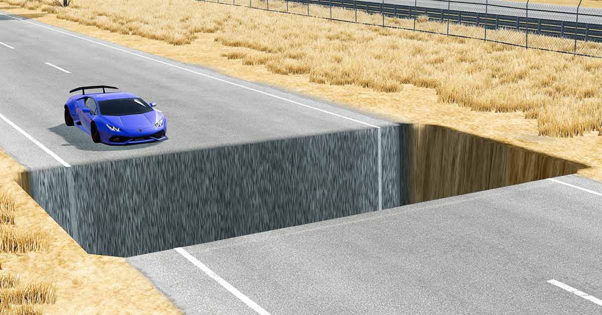 simulation of cars driving over a pit