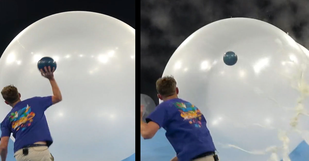 guy throwing a bowling ball into a balloon