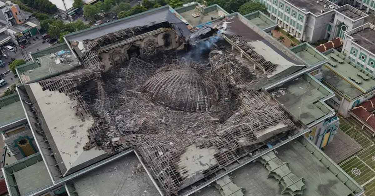 a mosque roof collapsed after a fire