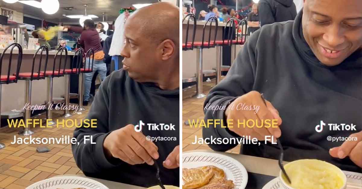 man eats his grits while two guys fight in a waffle house