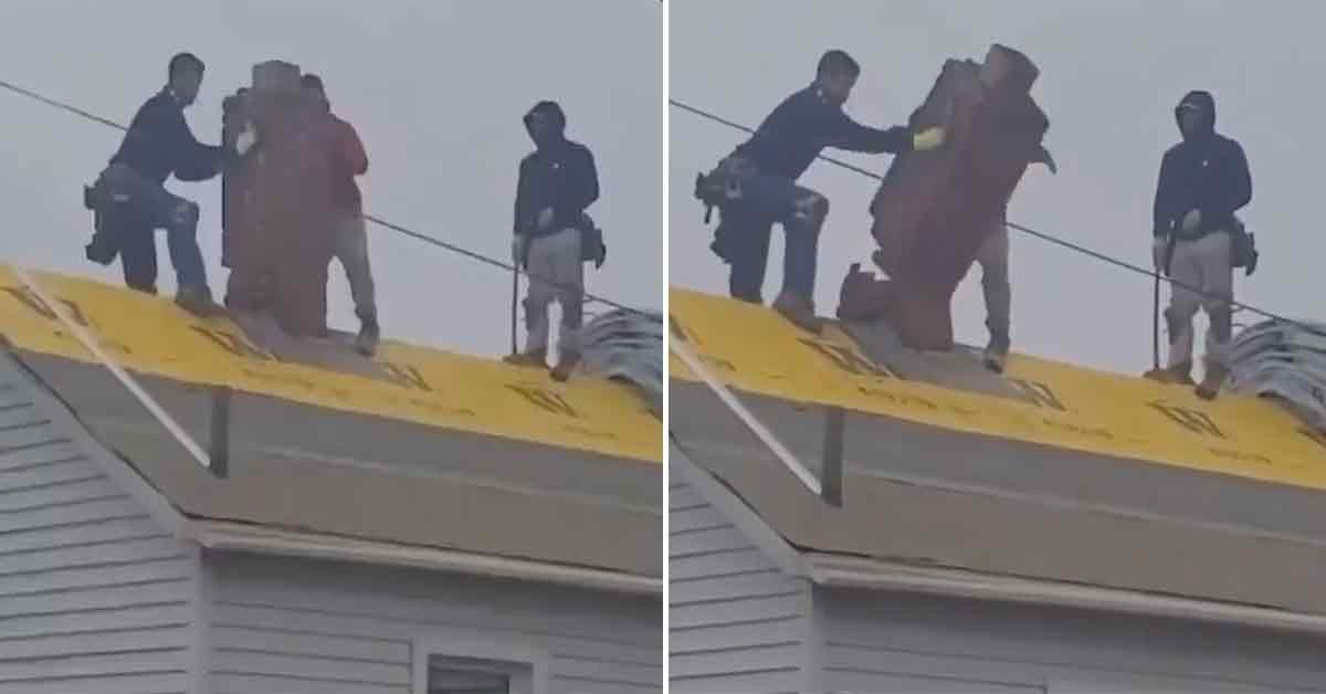 men on a roof trying to remove a chimney