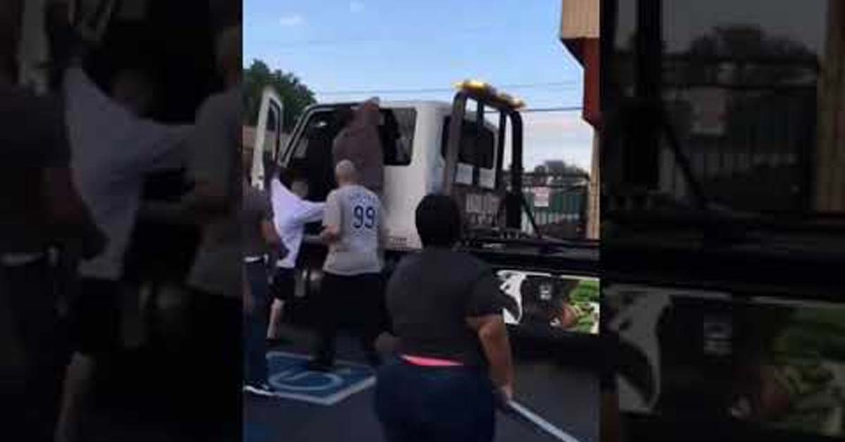 Drunk Tow Truck Driver Wreaks Havoc in Parking Lot Before Bystanders Intervene