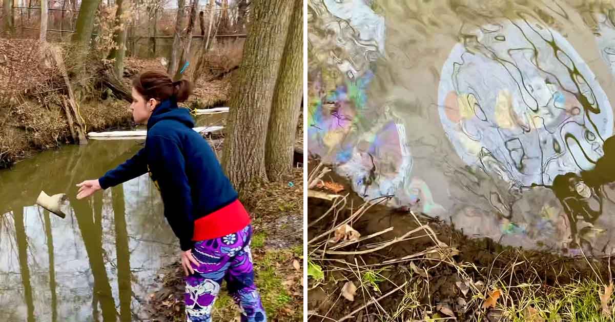 woman  throws a rock into a river in Ohio and you can see how polluted the water truly is