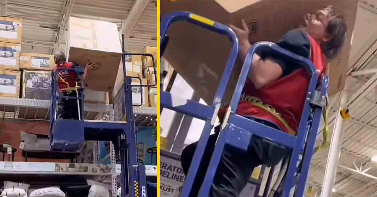 lowe's worker struggling with box