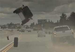 Truck Tire Pops Off and Causes a Car to Flip on Freeway