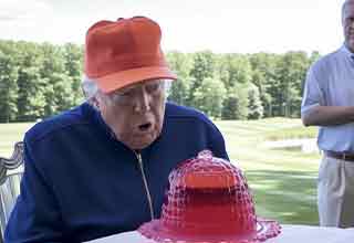 AI image of Donald Trump looking at a Jello mound