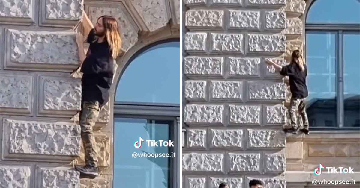 Jared Leto climbs the side of a hotel