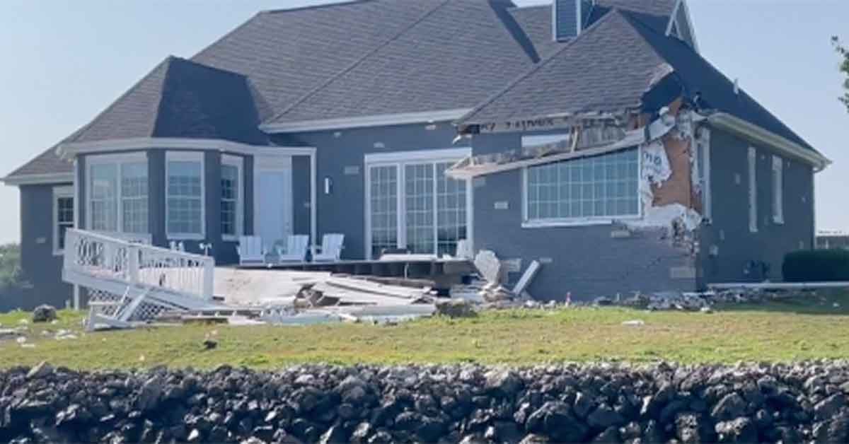 boat crashes into a house