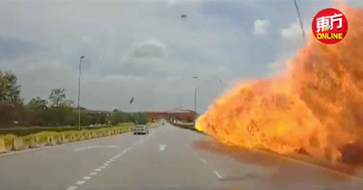 Malaysian Plane Crashes Right Next to Guy on the Highway