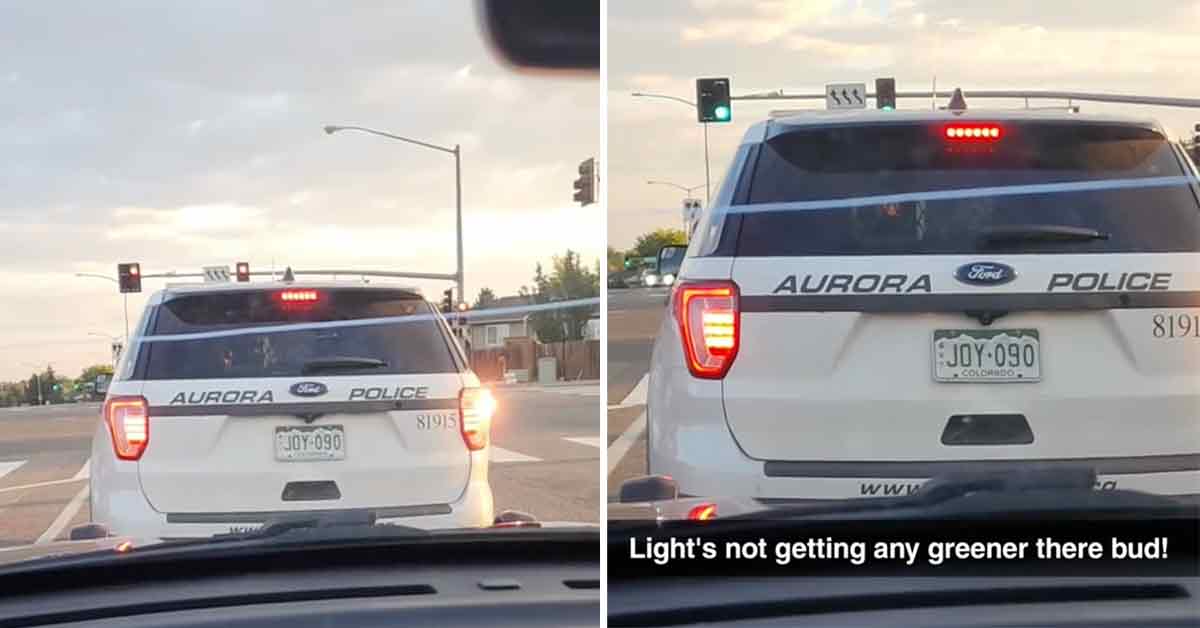 man honking at a cop after the light turns green