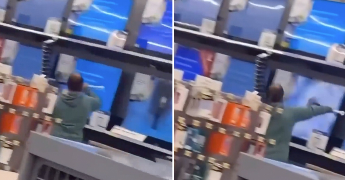 man smashing tvs in walmart