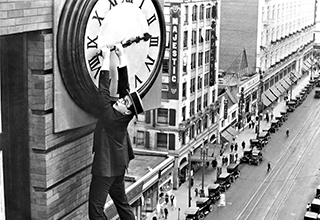 <p>While the Silent Era may be most commonly associated with slapstick gags, piano trills, and tiny mustaches, the early days of film had another claim to fame — featuring the most insane stunts in all of cinema.&nbsp;</p><p><br></p><p>From actors danging from clocks and swinging from trains, here are 12 pictures from the silent era that prove that OSHA didn't exist yet.&nbsp;</p>