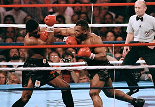 <p>Long before the Paul brothers and other YouTube stars dominated pay-per-view matches, the world of boxing was defined by once-in-a-generation talents, with fighters like <span data-mce-style="font-weight: bold;">Muhammad Ali,</span> Mike Tyson and George Foreman hitting the ring with their gloves on. But with celebrated athletes come even more celebrated photos, split-second snapshots capturing just how incredible the sport was in its heyday.&nbsp;</p><p><br></p><p>From Ali defending his status as boxing's GOAT to legendary TKOs as captured from above, here are the 33 most iconic photos in boxing history.&nbsp;</p>