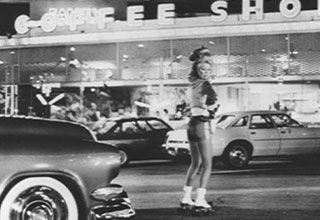 <p>Long before hungry Americans ponied up $25 for a single burrito on Postmates, DoorDash or whatever delivery app claims to fairly compensate its workers, there was another way to get a meal on wheels — heading down to your local drive-in to get a hamburger served to you by a skate-clad waitress.&nbsp;</p><p><br></p><p>From a New York City waitress taking a (probably) much-needed smoke break to the Kennedy family enjoying a cheap breakfast, here are 21 photos from the '50s, '60s, and '70s that belong on<em>&nbsp;Diners, Drive-Ins and Dives.</em></p>