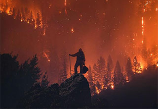 <p>Though wildfires may be increasingly common in California's arid landscape — including the three currently scorching the state's southern region — their orange-tinted sights aren't easy to get used to. Case in point? These blazing photos of flames engulfing cars, trees, and mountains that look like something straight out of a disaster film.&nbsp;</p><p><br></p><p>From a seemingly burning Sun to a floating telephone line plucked right from Ethel Cain's fever dreams, here are 28 disastrous photos from California Wildfires past and present.&nbsp;</p>