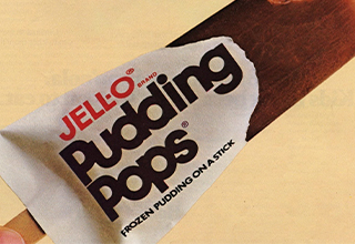 <p>If the '70s were defined by aspic-coated monstrosities and flavor-fueled treats, the '80s braved the new frontier of shelf/fridge stable goods. Enter proto-Chex Mix, 50 shades of pudding and pudding adjacent snacks and of course, a weird foot-shaped popsicle thrown in for good measure.&nbsp;</p><p><br></p><p>From Smurf-branded cereal to shark-shaped gummies, here are 20 things that passed for snacks in the 1980s&nbsp;</p>