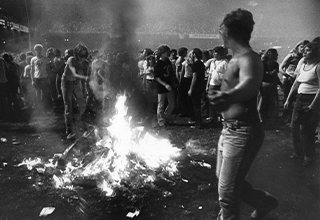 <p>Though Disco may have been popularized in the '70s, not everyone was willing to wear uncomfortably tight pants. Disco disdain (in)famously reached a fever pitch in July 1979, when local shock-jock radio host Steve Dahl hosted a "Disco Demolition Night" at the Chicago White Sox's Comiskey Park.</p><p><br></p><p>Encouraging disco detractors to bring their records and burn them amid the doubleheader between the Windy City team and the Detroit Tigers, the demonstration quickly devolved into a blazing riot. When all was said and done, 30 people were injured and 39 arrested, with hundreds of disco records destroyed.&nbsp;</p><p><br></p><p>From bonfires to showdowns with the authorities, here is the insane story of 1979's Disco Demolition Night as told in photos.&nbsp;</p>