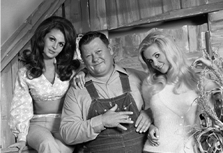 <p>Since its early days on air, no one helped shape country-themed variety show, <em>Hee Haw</em>, quite like Junior Samples. With his signature overalls and his own eponymous segment, "Samples Used Car Sales," the comedian never failed to crack us, and himself, up.</p><p><br></p><p>From the school scenes to the cover of his record, here are 21 pics of Junior Samples during his 'Hee Haw' heyday.&nbsp;</p>