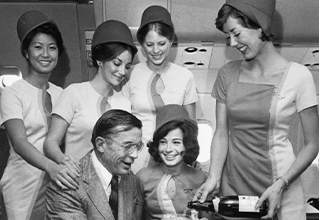 <p>More so than its affordable prices and its self-proclaimed status as "The World's Friendliest Airline," Pacific Southwest Airlines' claim to fame was simple: It's stunning flight attendants.&nbsp;</p><p><br></p><p>Clad in pink and orange uniforms, these lovely ladies embodied the care and attentiveness that made a stewardess successful ... all while looking as beautiful as the clear blue sky at 40,000 feet.&nbsp;</p><p><br></p><p>From pillbox hats to wing photoshoots, here are 20 high-flying pics of Pacific Southwest Airlines flight attendants in the 1970s.&nbsp;</p>