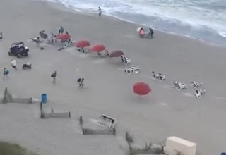 Woman Gets Attacked by Flying Umbrella