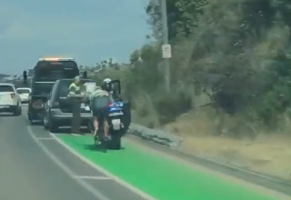 Cyclist Crashes Into Easily Avoidable Car Parked in Bike Lane