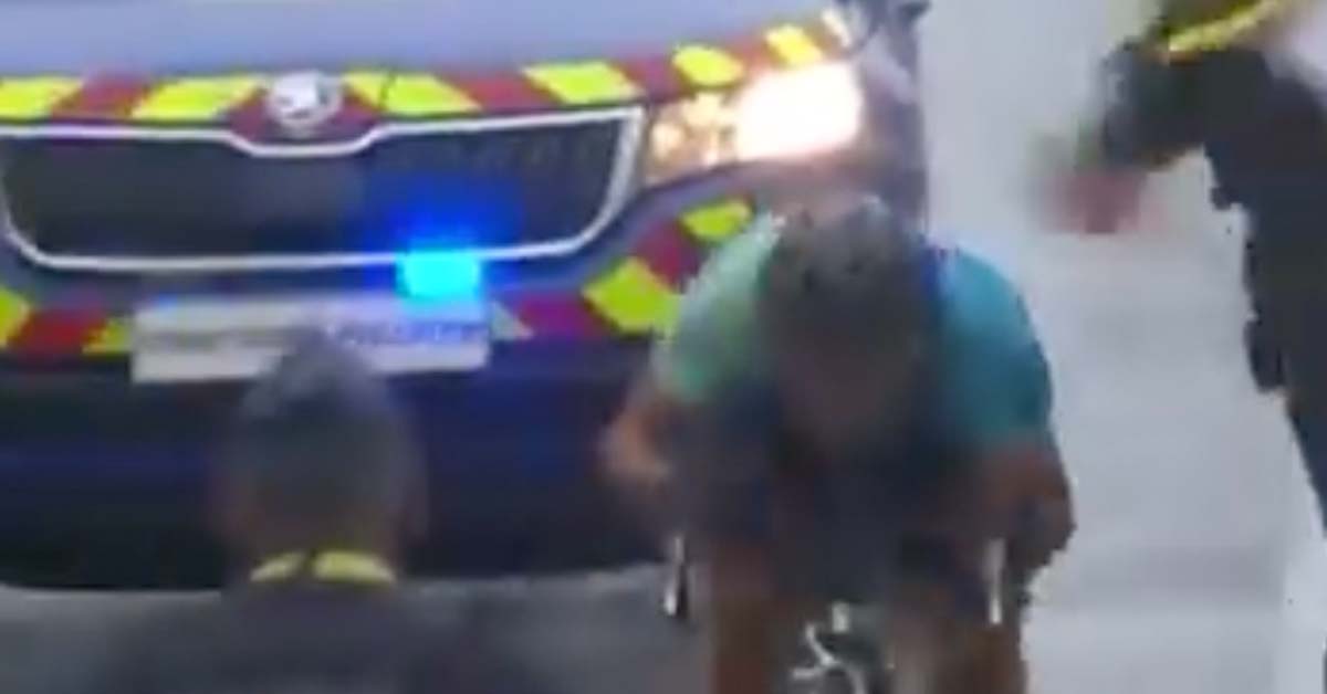 Police Tackle Tour de France Cyclist