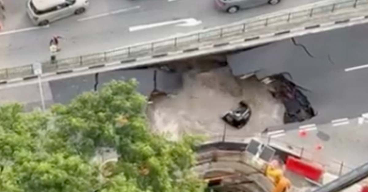Sinkhole Randomly Opens Up, Begins Eating Cars