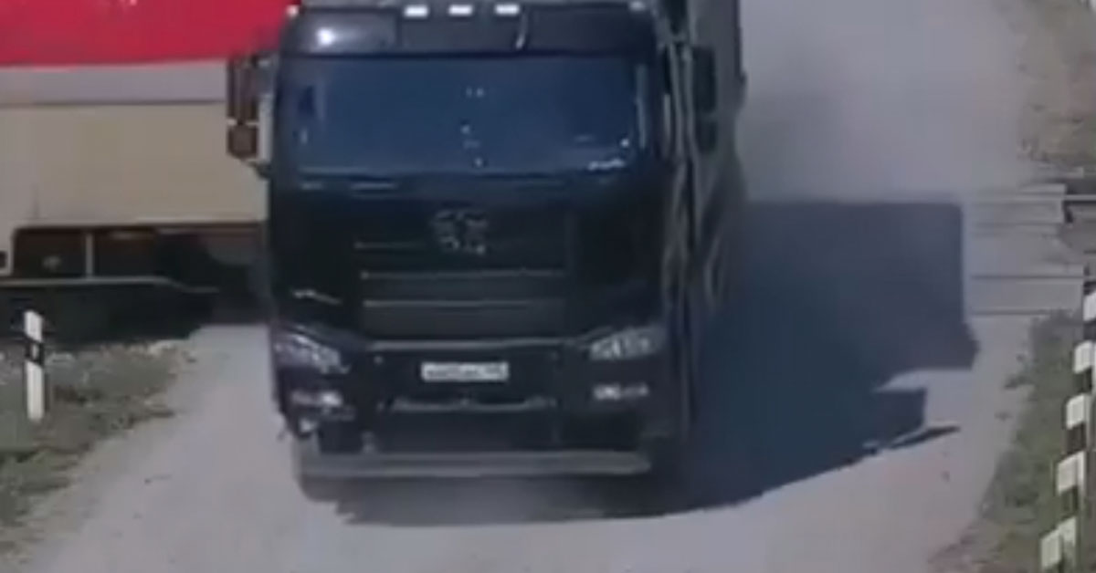 Train Crashes Through Rear End of Truck