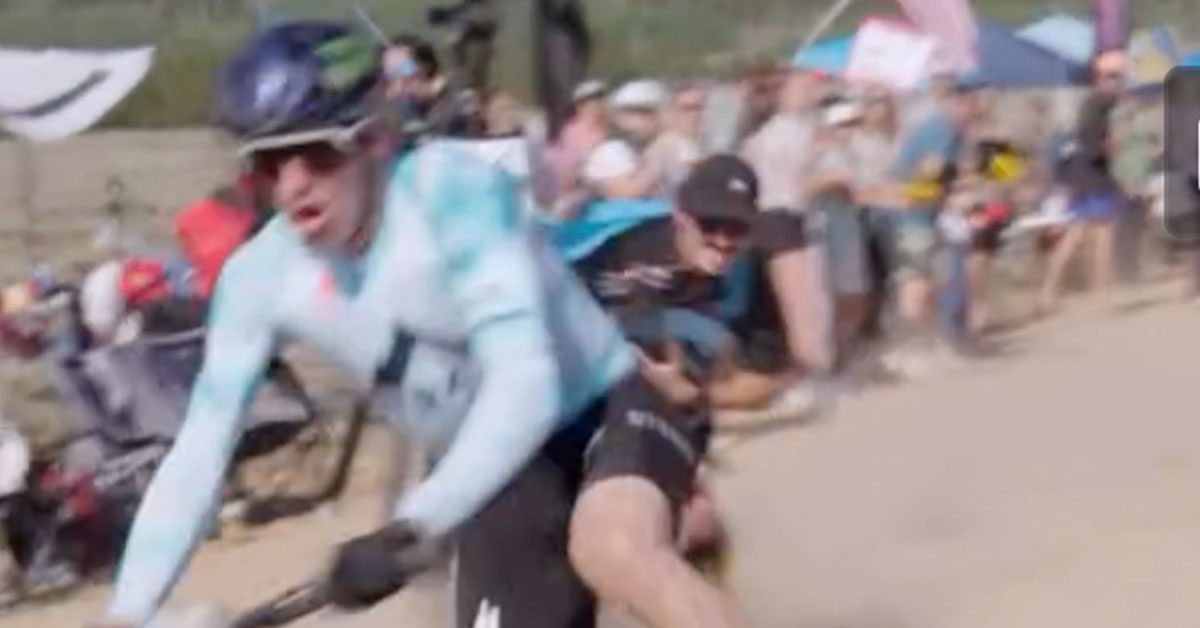 Cyclist Gets Knocked Off Bike by Overly-Eager Reporter
