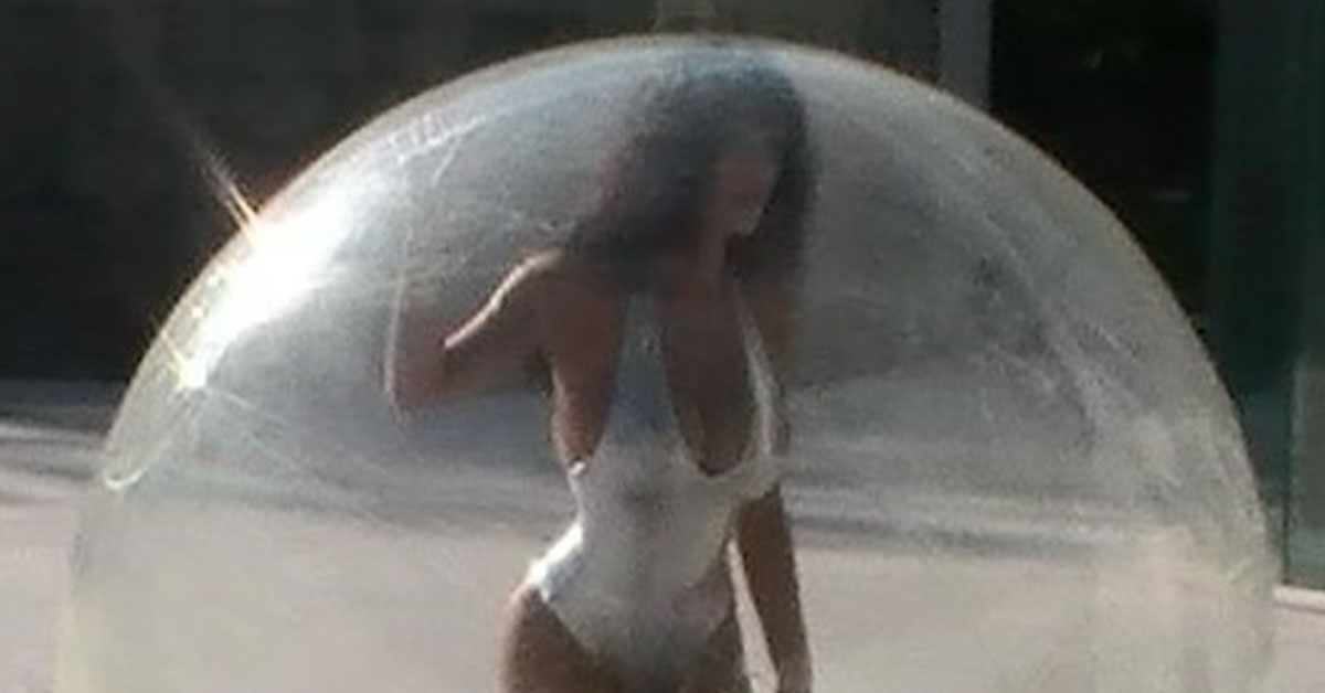 Kanye Has Now Turned His Scantily-Clad Wife into the Bubble Boy